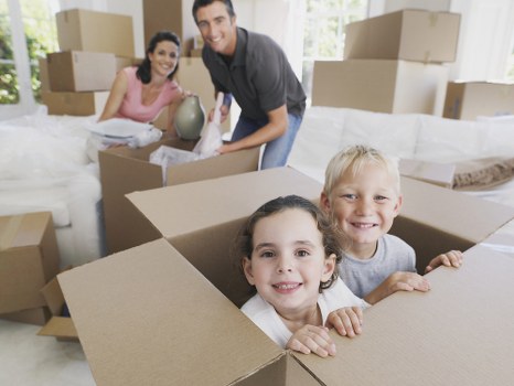 Local student removals team handling boxes and furniture in Stockwell