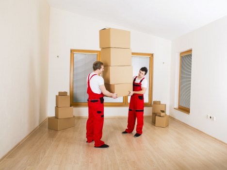 Careful removal of heavy furniture from a Stockwell flat with narrow access